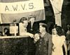 With Reginald Gardner at Joan Bennett's war benefit (September 4), Movie Story December 1942
