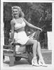 Sitting by the pool (1946)