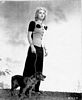 Modeling with dog c. 1939