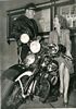 With Officer Langford on a Harley, Enthusiast May 1944