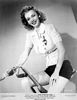 Preparing for The Powers Girl (1942) with too much lipstick