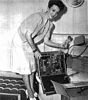 Carole with a projector (1942), American Cinematographer April 1943