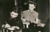 Signing autographs with Kay Francis, Saturday Evening Post January 1, 1944