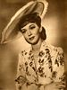 A lovely outfit from It Happened in Flatbush, Screen Romances June 1942